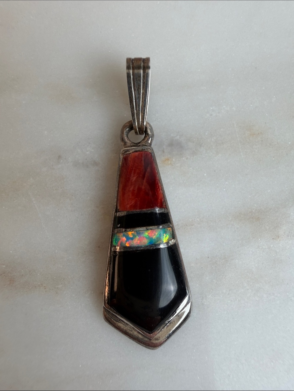 Vintage Navajo Signed “V” Onyx, Coral , and Opal inlay Sterling Pendant